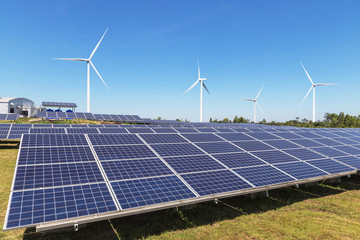 solar cells or solar panels or photovoltaic cells with wind turbines generating electricity alternat