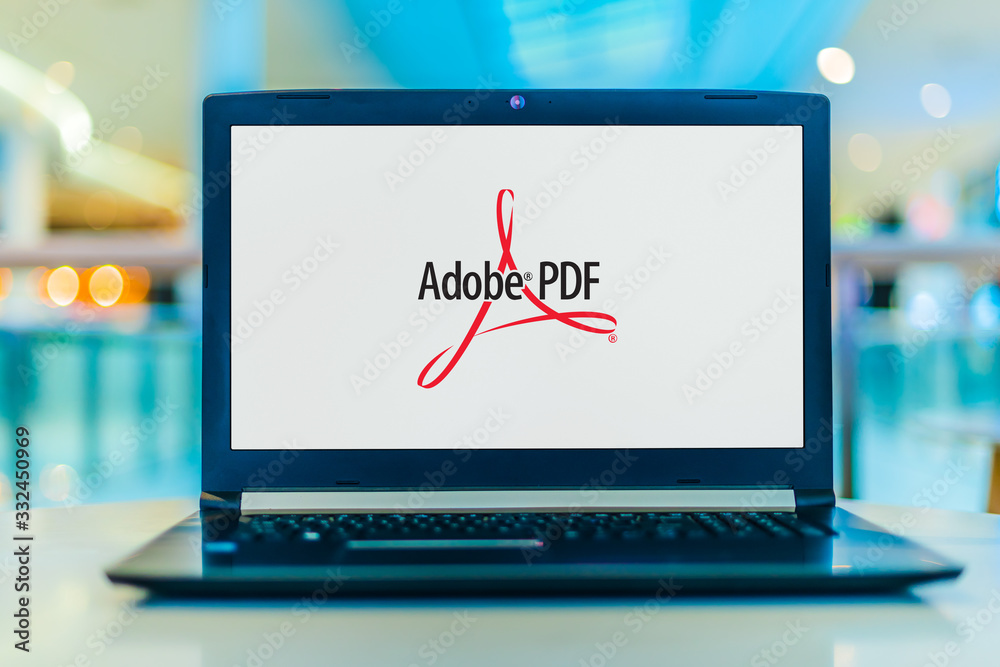 Computer. Adobe Laptop computer displaying logo of Adobe Acrobat Stock Photo | Adobe Stock