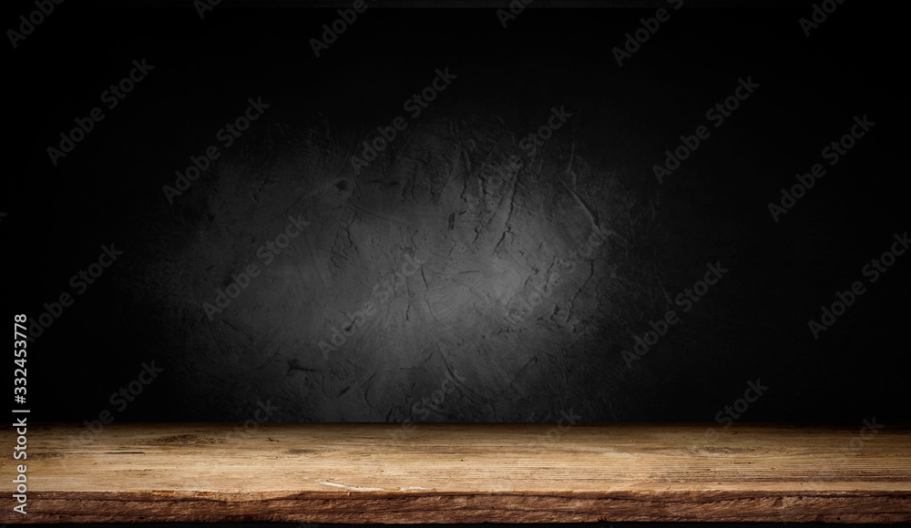 Selected focus empty brown wooden table and wall texture or old black brick wall blur background image. for your photomontage or product display - obrazy, fototapety, plakaty 
