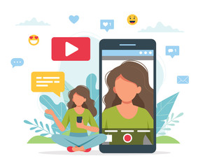 Leinwandbilder - Video blogger recording video with smartphone. Different social media icons. Cute vector illustration in flat style