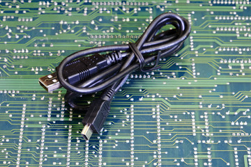 Usb cable wire against electronic circuit board