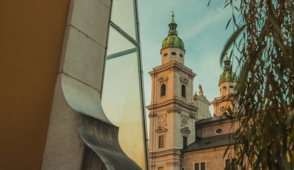 Southern bell tower of Salzburg cathedral on a sunny autumn day, during the late afternoon hours.