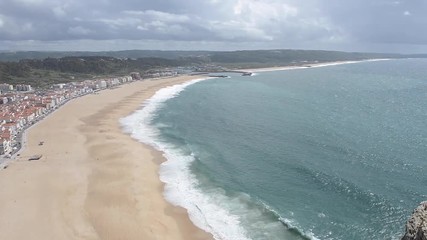 Poster - Aerial view of the beach in Nazare, Portugal, from the Suberco vista point. Nazare is a surfing paradise town.