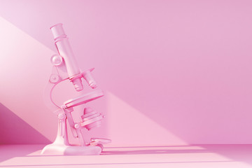 Wall Mural - pink retro microscope illuminated by ray of light