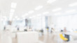Leinwandbild Motiv Abstract blurred interior modern office space with business people working banner background with copy space.
