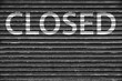 CLOSED - inscription on the closed institution. inscription on the old Roll-up blinds.