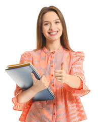 Sticker - Young female student showing thumb-up on white background