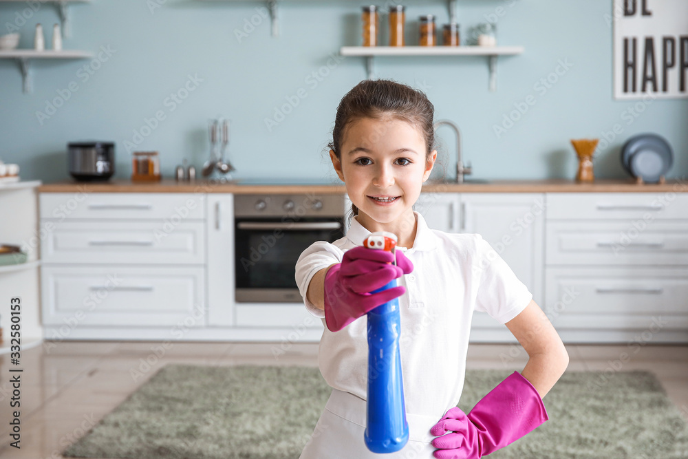 Cute little chambermaid in kitchen