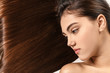 © Pixel-Shot - Healthy long brown hair and beautiful woman face, hair care and beauty industry concept, natural hair growth and shine