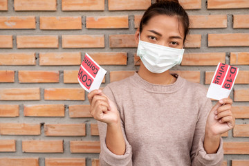 Young woman wearing protection face mask To prevent Virus infection, epidemics covid-19 and PM 2.5