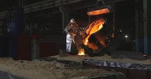 The Molten Metal Is Poured Into The Mold. Melting Furnace For Cast Iron And Steel And Liquid Metal.