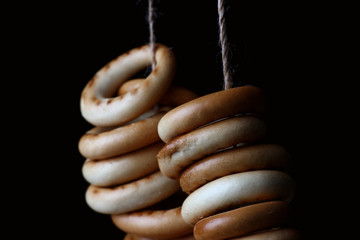 Wall Mural - bread rolls in a bundle on a dark background