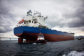 Poster - launching of renovated tanker cargo ship from dock to water.