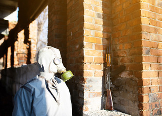 Stalker in a protective suit with a gun