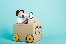 Children Boy Smile In Driving Play Car Creative By A Cardboard Box Imagination With Megaphone