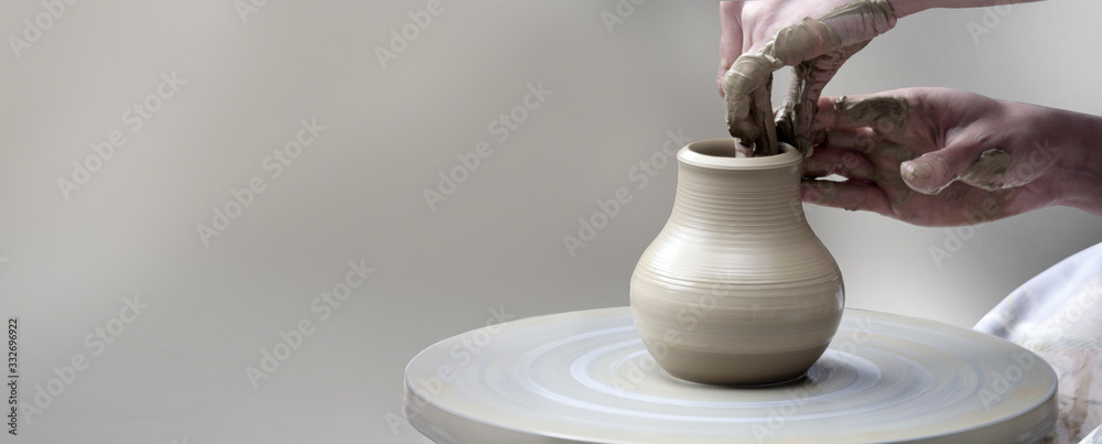  hands making ceramic cup - obrazy, fototapety, plakaty 