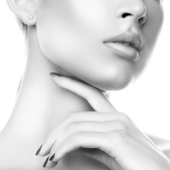 Wall Mural - Lips, beauty young woman part of face, perfect skin, hand. Skincare facial treatment female health conceptMonochrome