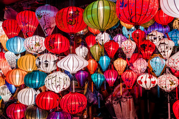 Traditional colorful lanterns spread light on the old street of Hoi An Ancient Town - UNESCO World Heritage Site. Vietnam in 2019.