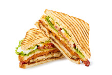 Two Halves Of Club Sandwich On White