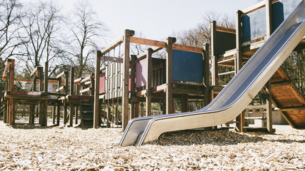 Abandoned Children Playground in quarantine - nobody playing outside, stricktly forbidden - smooth tracking shot.