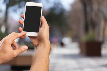 Sticker - Human hand holding smartphone with empty screen