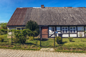 Poster - Old traditional house in Lacko village within Slawno County near Baltic Sea coast, Poland