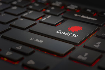 computer keyboard with covid 19 symbol on the enter key