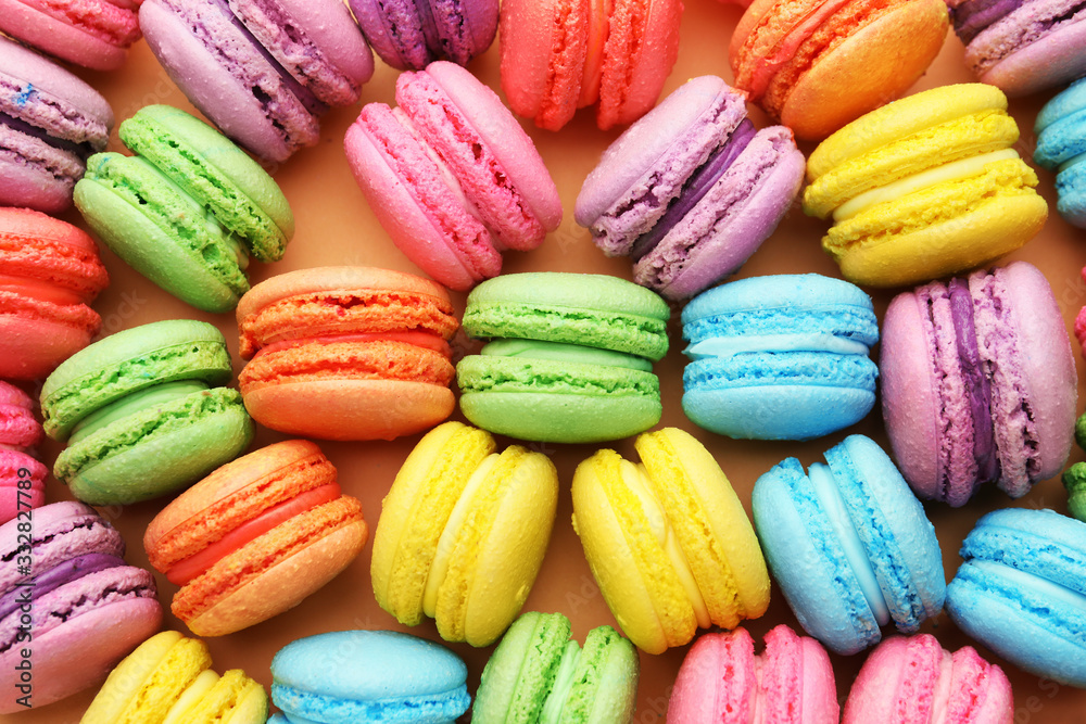 Many tasty macarons as background