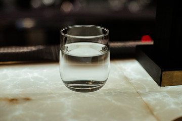 glass of wine on wooden table