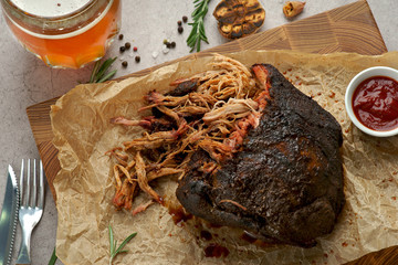 Wall Mural - a piece of torn pork with sauce a glass of beer