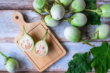 Fresh green Eggplant on the kitchen table