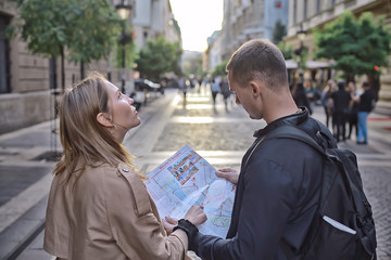 tourists in the city with a map, trip travel city map tourism