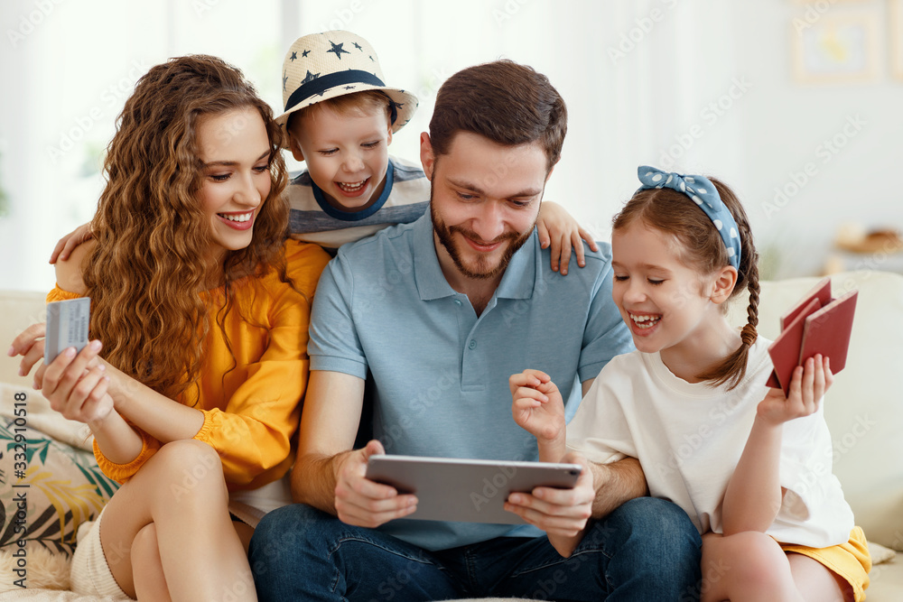 Smiling parents with kids gathering on sofa using tablet while picking tour online anticipating summer vacation all together. - obrazy, fototapety, plakaty 