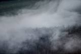 Fototapeta Na ścianę - clouds over mountains