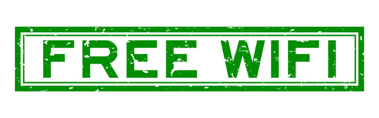 Sticker - Grunge green free wifi word rubber seal stamp on white background