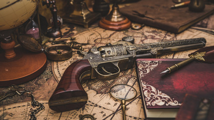 Wall Mural - Pistol Gun On World Map