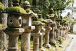 © MaaHoo Studio/Stocksy - Close up of sculptural stone pillars,Japanese Shinto shrine