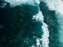 Aerial Drone View Of Spashing Waves In Blue Ocean