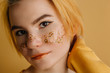 © Liliya Rodnikova/Stocksy - Girl with yellow stars like freckles on her cheeks