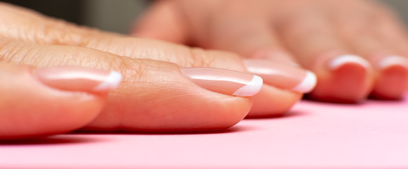 female fingers with a beautiful manicure. front view, close-up