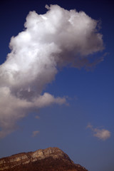 Wall Mural - clouds in the sky,day, mountain, fluffy, blue, nature, weather, white, cloudy, landscape,atmosphere, cumulus, 