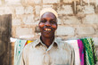 © Kike Arnaiz/Stocksy - Powerful smile of a humble man from Zanzibar