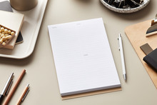 Blank Paper Of Notepad And Supplies