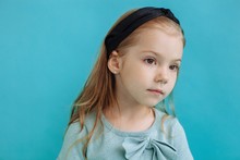 Stylish Little Girl Portrait On Blue