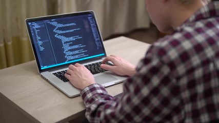 Man coding html on screen man hands coding programming on screen laptop