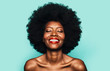 © MyMicrostock/Stocksy - Topless Happy Afro Woman posing over blue background