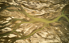 Dirty River In Rough Terrain