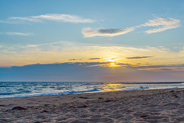 Wall Mural - Sunset on the beach on north side of the Provincelands Cape Cod, Atlantic ocean view MA US.