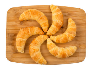 Croissant bread of bake Breakfast in the morning for health or diet food in Wooden tray on the white background