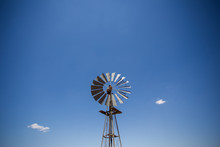 Wide Amgle View Of A Lone Windpomp / Windmill On The Plains Of T